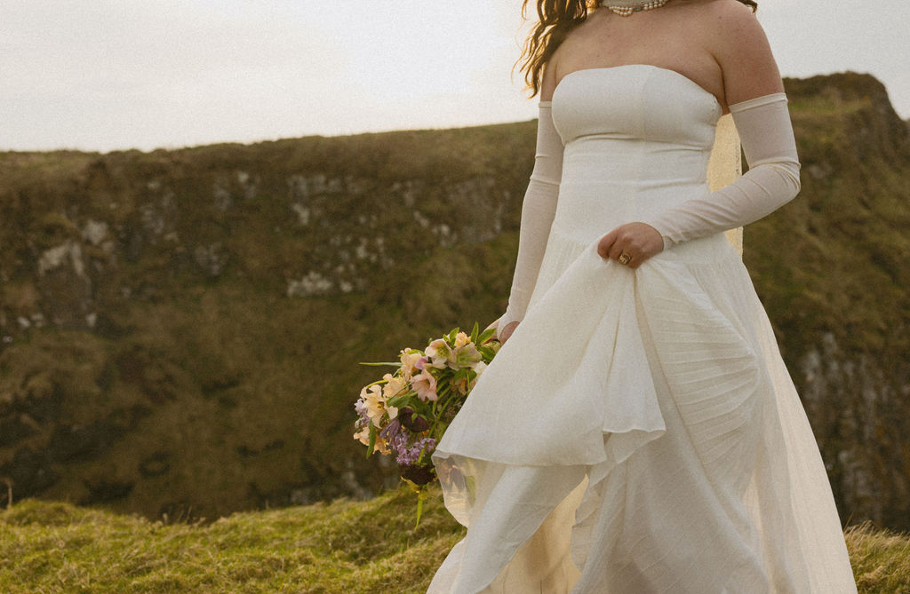 Couple embracing during Cliffs of Moher engagement session at sunset

Candid moment between engaged couple with wind-swept hair on Irish cliffs

True-to-life engagement photo at the edge of the Cliffs of Moher

Documentary-style engagement portrait in front of dramatic Irish landscape

Organic and natural engagement photography at iconic Cliffs of Moher

Laughing couple captured during authentic Cliffs of Moher photo session

Emotive engagement shoot with Atlantic Ocean backdrop in Ireland

Genuine moment from Cliffs of Moher engagement shoot in soft natural light