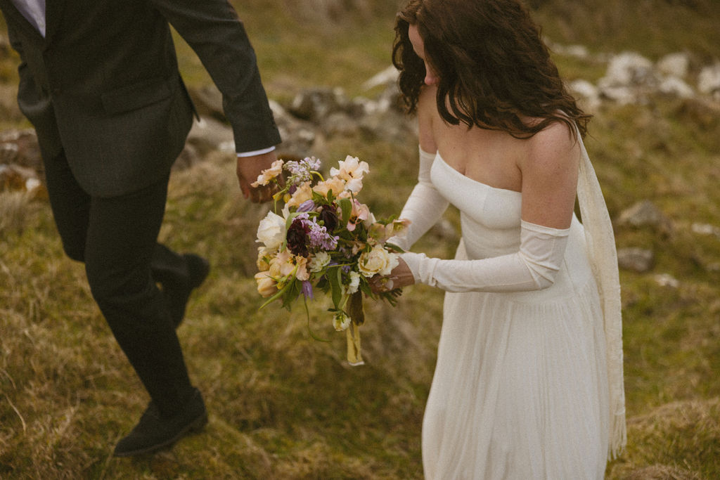 Couple embracing during Cliffs of Moher engagement session at sunset

Candid moment between engaged couple with wind-swept hair on Irish cliffs

True-to-life engagement photo at the edge of the Cliffs of Moher

Documentary-style engagement portrait in front of dramatic Irish landscape

Organic and natural engagement photography at iconic Cliffs of Moher

Laughing couple captured during authentic Cliffs of Moher photo session

Emotive engagement shoot with Atlantic Ocean backdrop in Ireland

Genuine moment from Cliffs of Moher engagement shoot in soft natural light